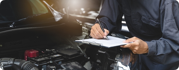 Mechanic with checklist